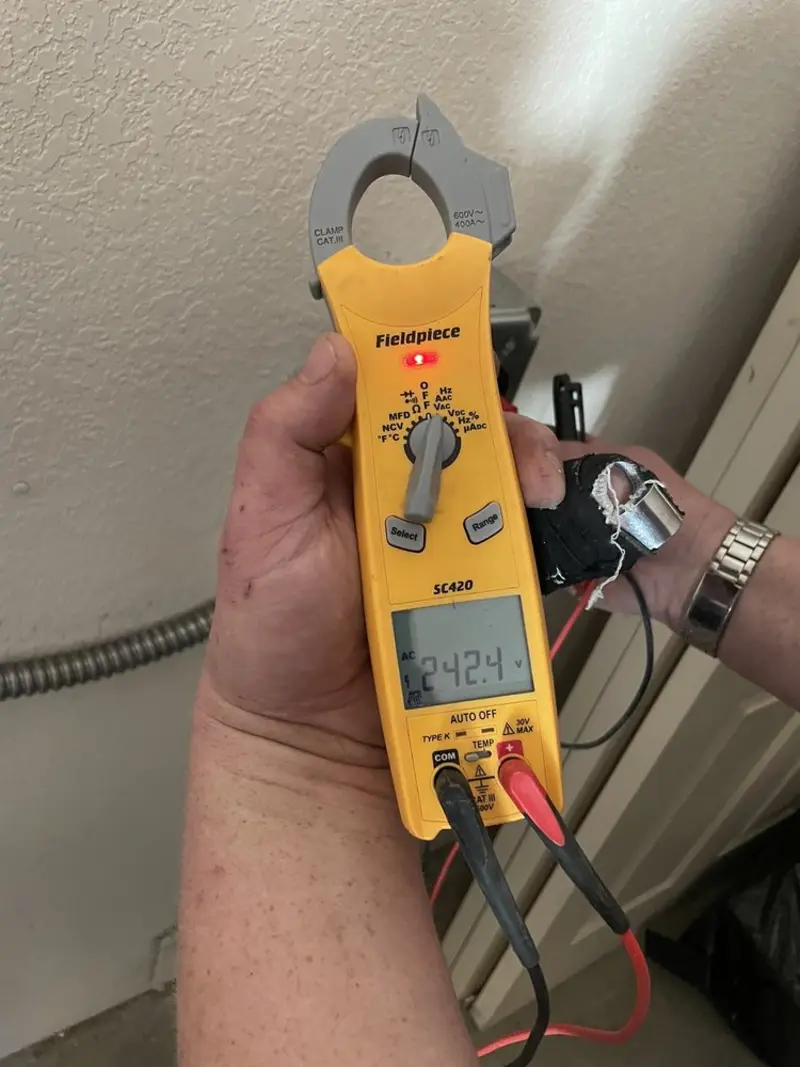 Voltage testing with clamp meter during Hot Tub / Pool Electrical Wiring in Little Chute